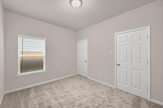 5096 Marcasca Dr, Katy, TX 77493 - unfurnished bedroom featuring carpet flooring and baseboards