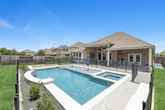 15519 Ponderosa Bend Dr, Cypress, TX 77429 - view of pool featuring a patio, a fenced backyard, and a pool with connected hot tub