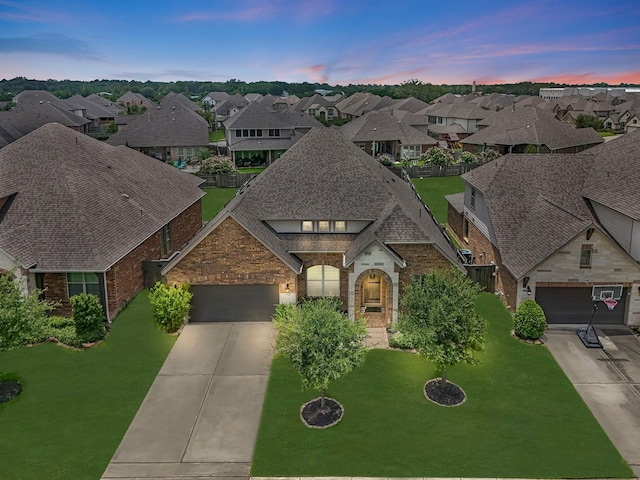 15519 Ponderosa Bend Dr, Cypress, TX 77429 - view of front of home featuring brick siding, driveway, a residential view, and an attached garage