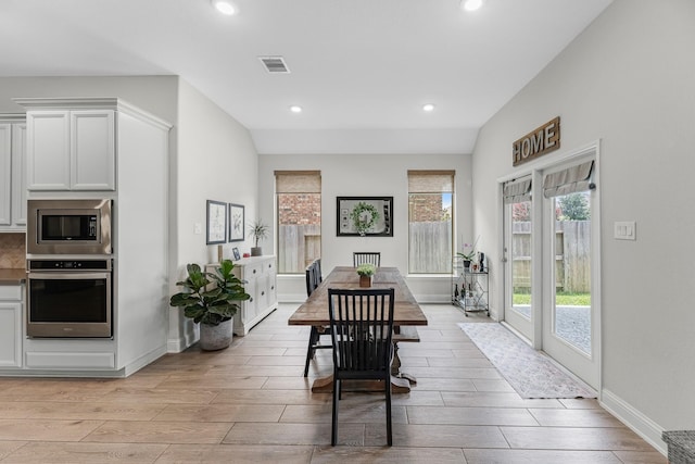 15519 Ponderosa Bend Dr, Cypress, TX 77429 - dining space with wood tiled floors and recessed lighting