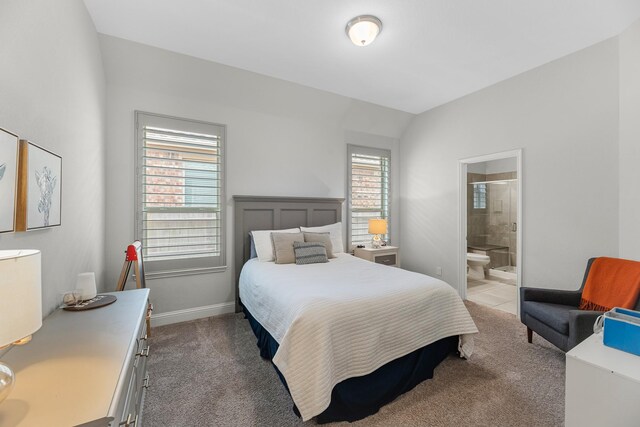 15519 Ponderosa Bend Dr, Cypress, TX 77429 - bedroom featuring light colored carpet and connected bathroom