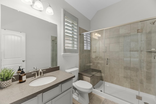 15519 Ponderosa Bend Dr, Cypress, TX 77429 - bathroom featuring lofted ceiling, vanity, a stall shower, and tile patterned flooring