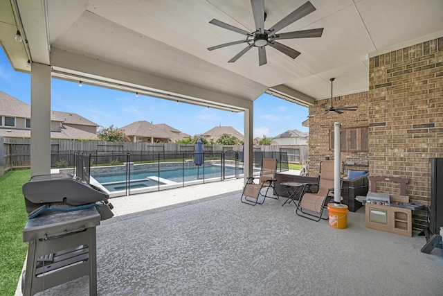 15519 Ponderosa Bend Dr, Cypress, TX 77429 - fenced backyard with ceiling fan, grilling area, a patio, a residential view, and a pool with connected hot tub