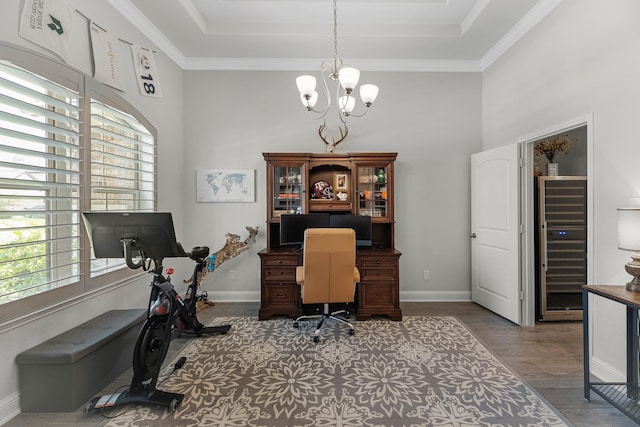15519 Ponderosa Bend Dr, Cypress, TX 77429 - office area with a high ceiling, a chandelier, wood finished floors, and crown molding