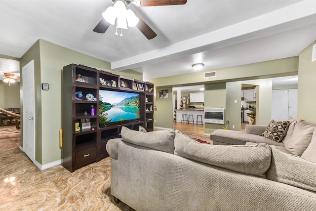 19757 Dorris Dr, Magnolia, TX 77355 - living room with heating unit, a ceiling fan, and light marble finish floors