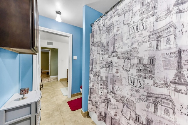 19757 Dorris Dr, Magnolia, TX 77355 - full bath with tile patterned flooring and curtained shower