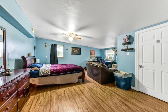 19757 Dorris Dr, Magnolia, TX 77355 - bedroom featuring light wood finished floors, multiple windows, and ceiling fan