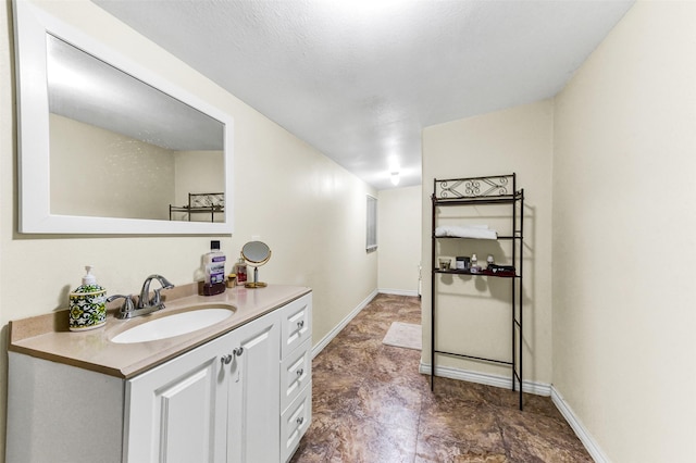 19757 Dorris Dr, Magnolia, TX 77355 - bathroom with vanity and baseboards
