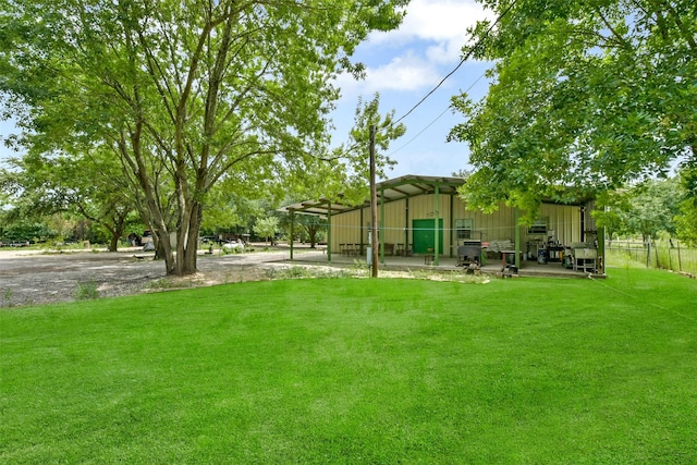 19757 Dorris Dr, Magnolia, TX 77355 - view of yard with an outbuilding