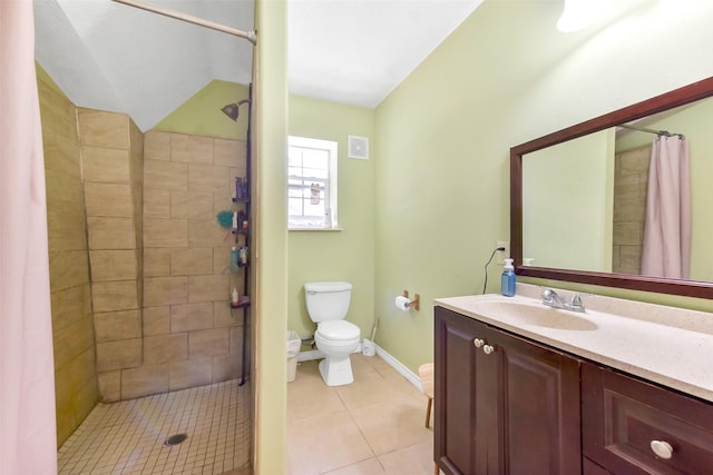19757 Dorris Dr, Magnolia, TX 77355 - bathroom with a stall shower, tile patterned floors, vanity, and vaulted ceiling
