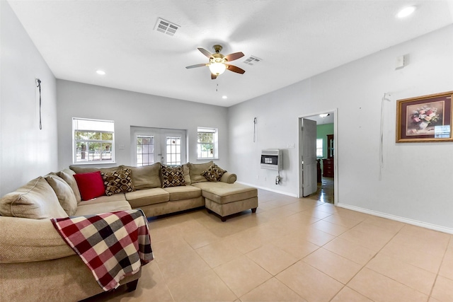 19757 Dorris Dr, Magnolia, TX 77355 - living room featuring ceiling fan, light tile patterned floors, recessed lighting, and heating unit