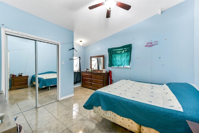 19757 Dorris Dr, Magnolia, TX 77355 - bedroom featuring vaulted ceiling, a closet, light tile patterned floors, and ceiling fan