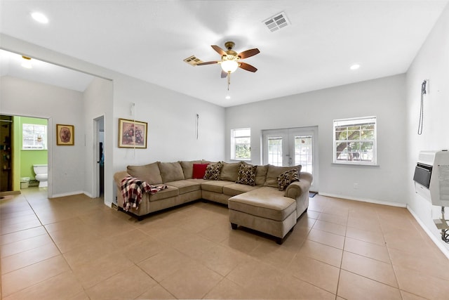 19757 Dorris Dr, Magnolia, TX 77355 - living room featuring plenty of natural light, ceiling fan, light tile patterned floors, and recessed lighting