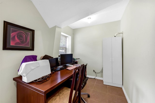 19757 Dorris Dr, Magnolia, TX 77355 - office area with lofted ceiling and tile patterned flooring