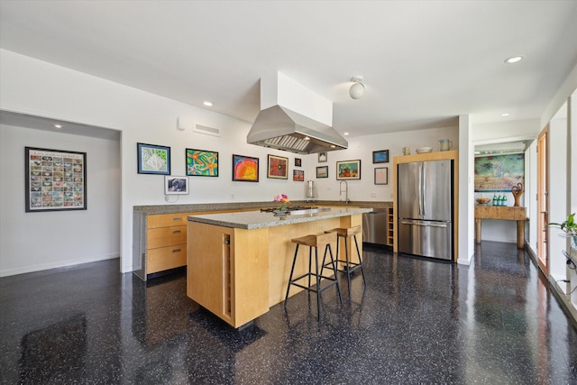 1306 Harbor Vw, Galveston, TX 77551 - kitchen featuring appliances with stainless steel finishes, island exhaust hood, a kitchen island, a kitchen bar, and recessed lighting