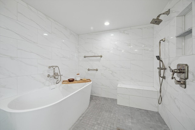 1306 Harbor Vw, Galveston, TX 77551 - full bath featuring a freestanding tub, a tile shower, tile walls, and tile patterned floors