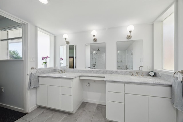 1306 Harbor Vw, Galveston, TX 77551 - full bath with a stall shower, double vanity, and tile patterned flooring