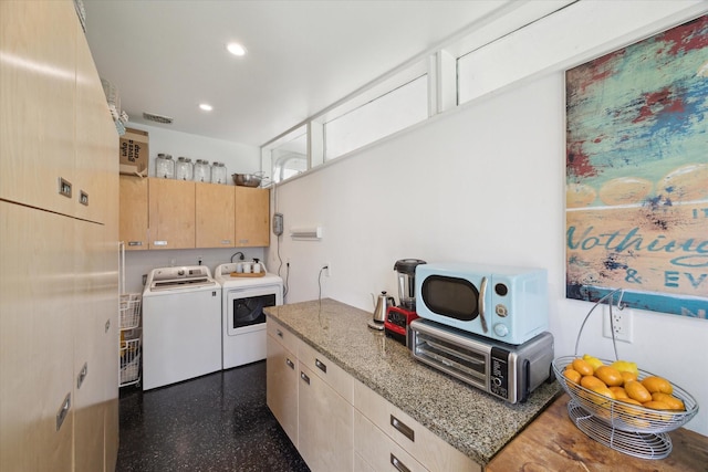 1306 Harbor Vw, Galveston, TX 77551 - kitchen featuring independent washer and dryer, light brown cabinetry, white microwave, recessed lighting, and light stone countertops