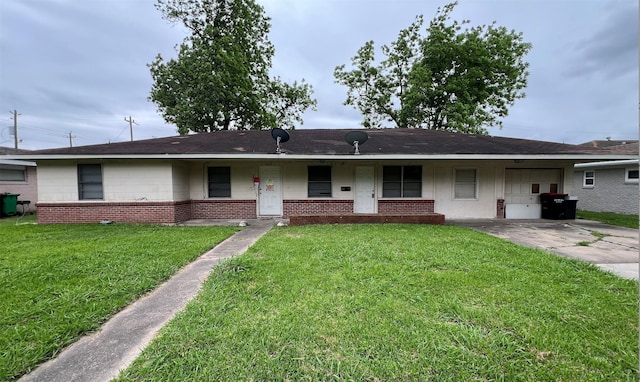 703 W Sterling St, Baytown, TX 77520 - ranch-style home with brick siding, a front lawn, concrete driveway, and a porch