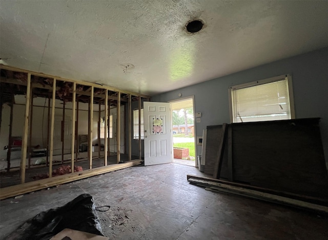 703 W Sterling St, Baytown, TX 77520 - misc room featuring a textured ceiling