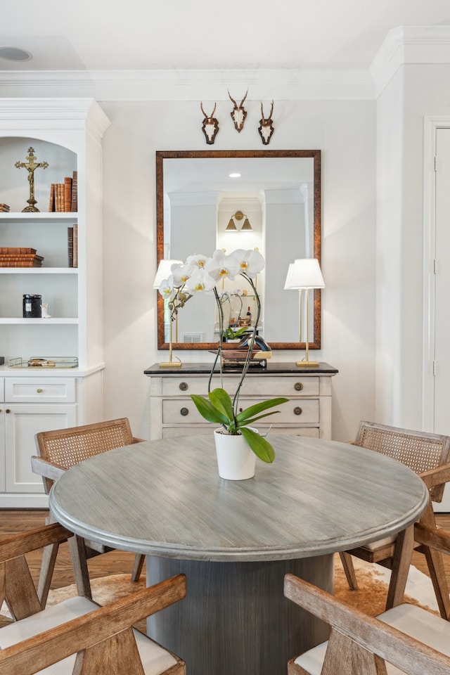 1010 W 24th St Unit N, Houston, TX 77008 - dining space featuring breakfast area and ornamental molding