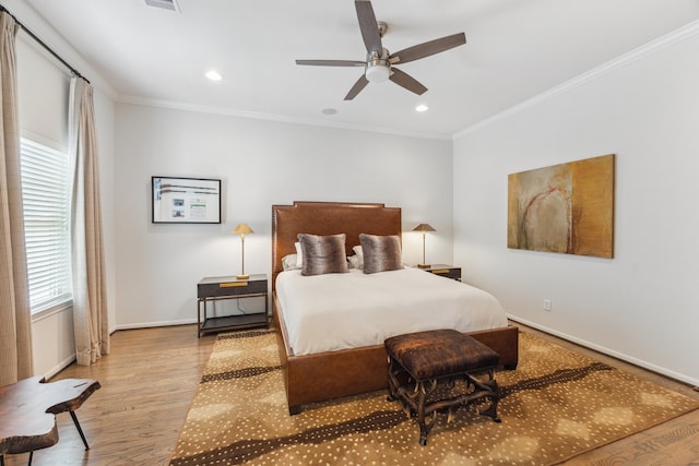 1010 W 24th St Unit N, Houston, TX 77008 - bedroom featuring crown molding, wood finished floors, recessed lighting, and ceiling fan