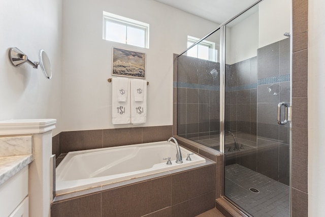 1010 W 24th St Unit N, Houston, TX 77008 - bathroom with a garden tub, a stall shower, and vanity