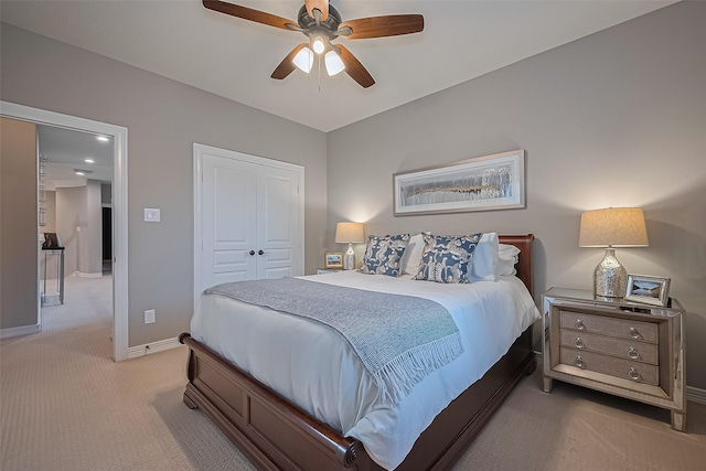 18315 Cape Lookout Way, Humble, TX 77346 - bedroom featuring light carpet, a closet, and ceiling fan