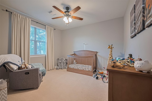 18315 Cape Lookout Way, Humble, TX 77346 - bedroom featuring carpet, a crib, and a ceiling fan