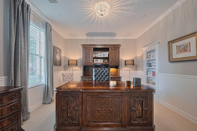 18315 Cape Lookout Way, Humble, TX 77346 - office area featuring built in shelves, light colored carpet, plenty of natural light, a wainscoted wall, and a decorative wall