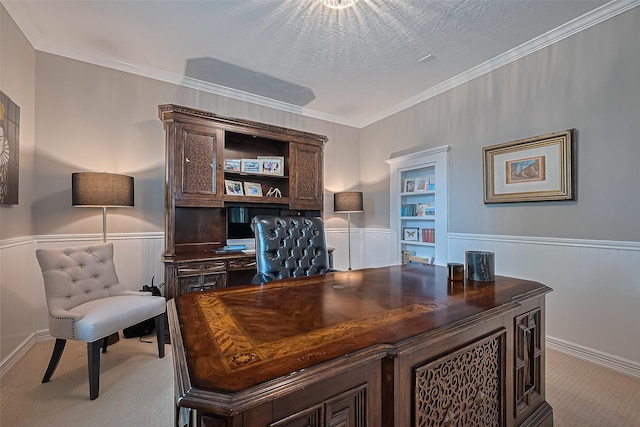18315 Cape Lookout Way, Humble, TX 77346 - office area featuring a wainscoted wall, carpet floors, built in shelves, and ornamental molding