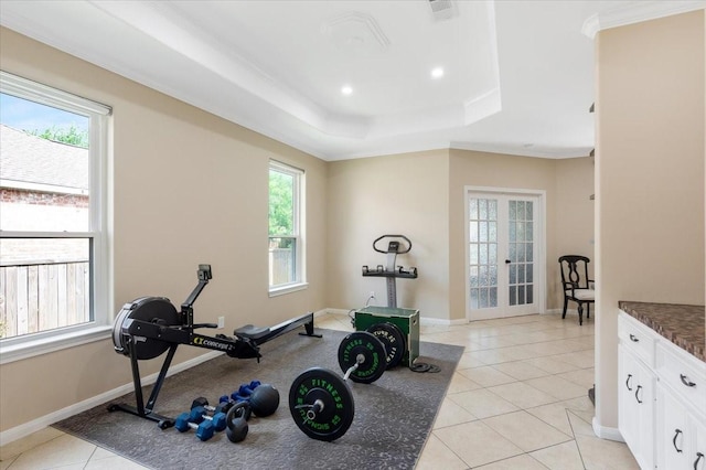5343 Oak Cove Dr, Houston, TX 77091 - exercise area with a raised ceiling, light tile patterned floors, french doors, recessed lighting, and crown molding