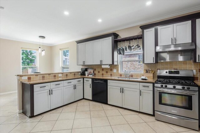 5343 Oak Cove Dr, Houston, TX 77091 - kitchen with stainless steel gas range, black dishwasher, a peninsula, decorative backsplash, and crown molding