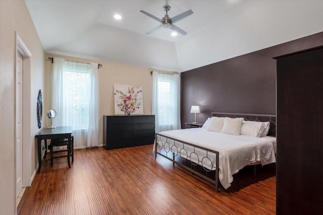 5343 Oak Cove Dr, Houston, TX 77091 - bedroom with multiple windows, wood finished floors, lofted ceiling, and a ceiling fan