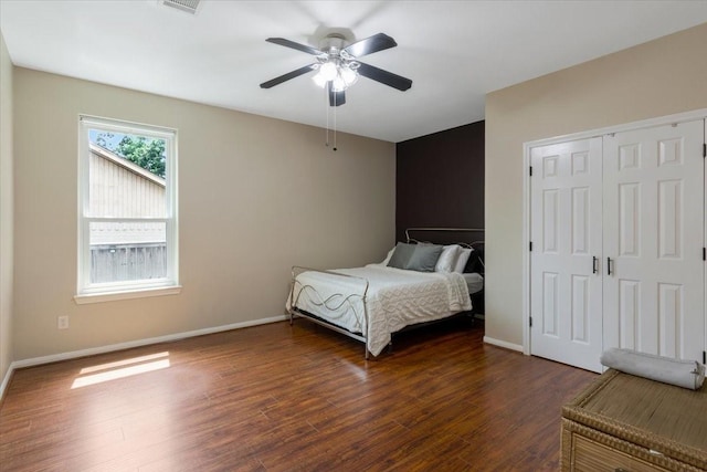 5343 Oak Cove Dr, Houston, TX 77091 - bedroom with dark wood finished floors, a closet, and ceiling fan