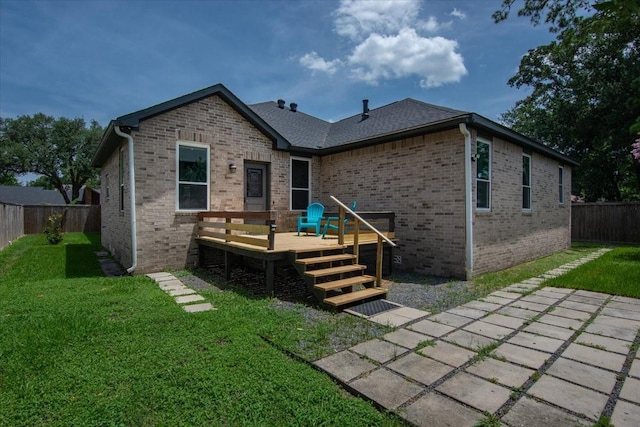 5343 Oak Cove Dr, Houston, TX 77091 - rear view of house with a wooden deck, a fenced backyard, brick siding, and a patio
