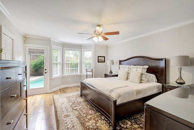 2120 Gostick St, Houston, TX 77008 - bedroom with light wood-style flooring, access to exterior, crown molding, and ceiling fan