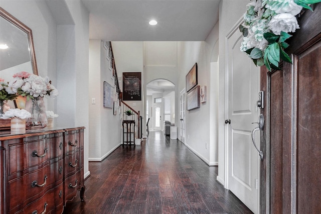 2302 Lakecrest Gardens Dr, Katy, TX 77493 - entrance foyer with arched walkways, dark wood-type flooring, stairway, and recessed lighting