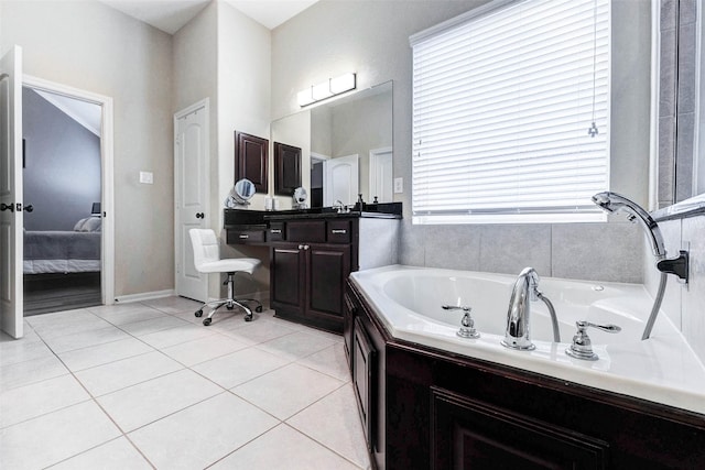2302 Lakecrest Gardens Dr, Katy, TX 77493 - bathroom with connected bathroom, a garden tub, tile patterned floors, and vanity