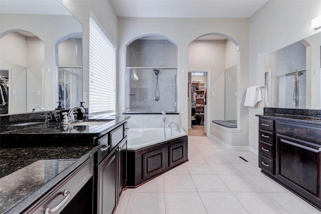 2302 Lakecrest Gardens Dr, Katy, TX 77493 - full bath featuring a spacious closet, vanity, and a stall shower