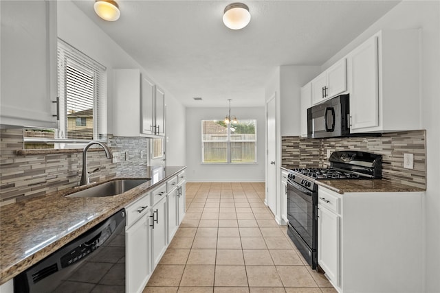 11007 View Pointe Ln, Houston, TX 77034 - kitchen featuring black appliances, white cabinets, tasteful backsplash, and light tile patterned flooring