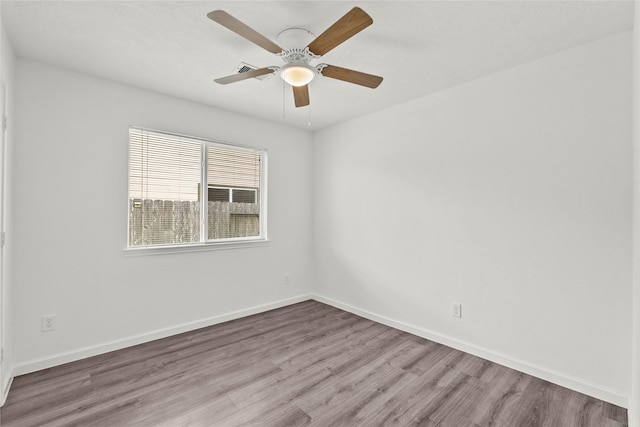 11007 View Pointe Ln, Houston, TX 77034 - empty room featuring wood finished floors and a ceiling fan