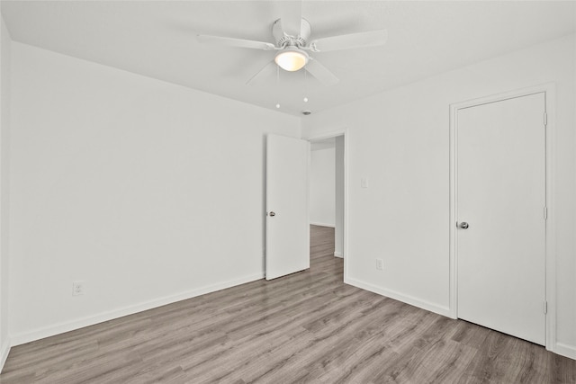 11007 View Pointe Ln, Houston, TX 77034 - unfurnished bedroom with wood finished floors and a ceiling fan
