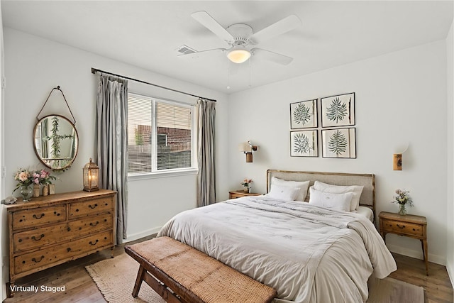 11007 View Pointe Ln, Houston, TX 77034 - bedroom with wood finished floors and ceiling fan