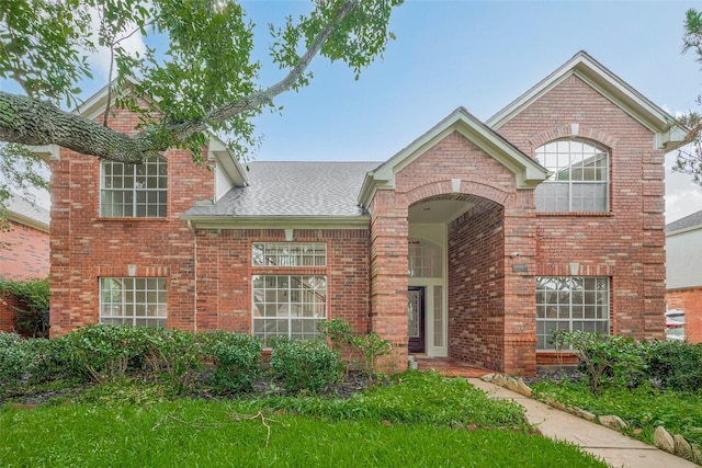 1615 Monvale Ln, Sugar Land, TX 77479 - traditional home featuring brick siding and a shingled roof