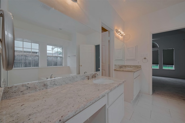 1615 Monvale Ln, Sugar Land, TX 77479 - bathroom featuring two vanities
