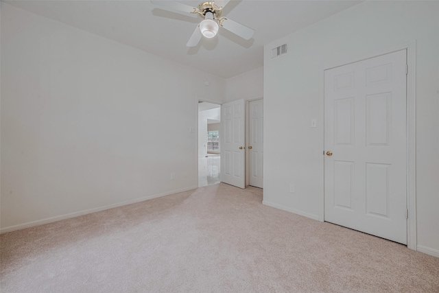 1615 Monvale Ln, Sugar Land, TX 77479 - unfurnished bedroom with light colored carpet and a ceiling fan