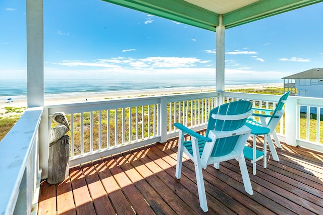 22831 Gulf Dr, Galveston, TX 77554 - deck featuring view of water and beach
