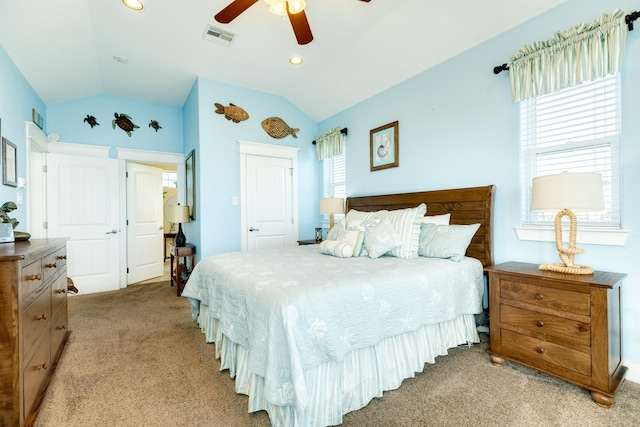 22831 Gulf Dr, Galveston, TX 77554 - bedroom featuring light carpet, vaulted ceiling, a ceiling fan, and a closet