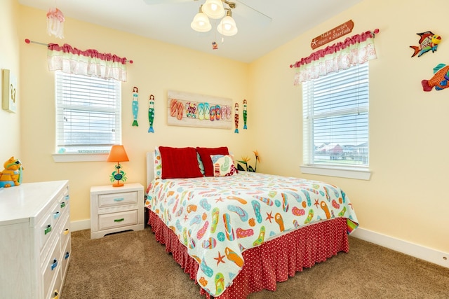 22831 Gulf Dr, Galveston, TX 77554 - carpeted bedroom with baseboards and a ceiling fan